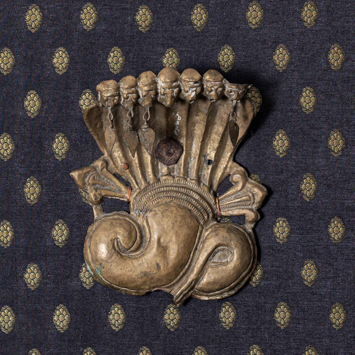 Vintage Repoussed Naaga framed on Brocade