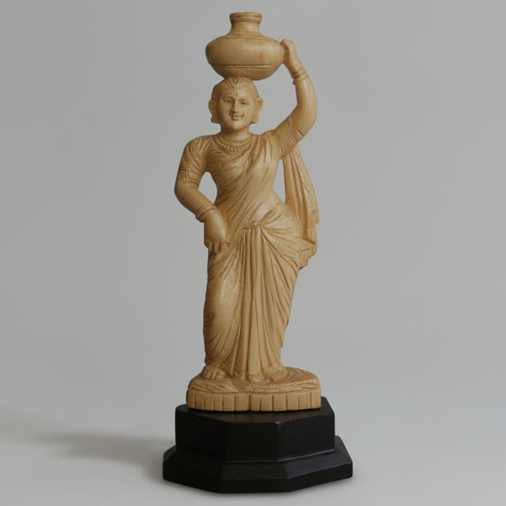 Lady holding a pot in wood